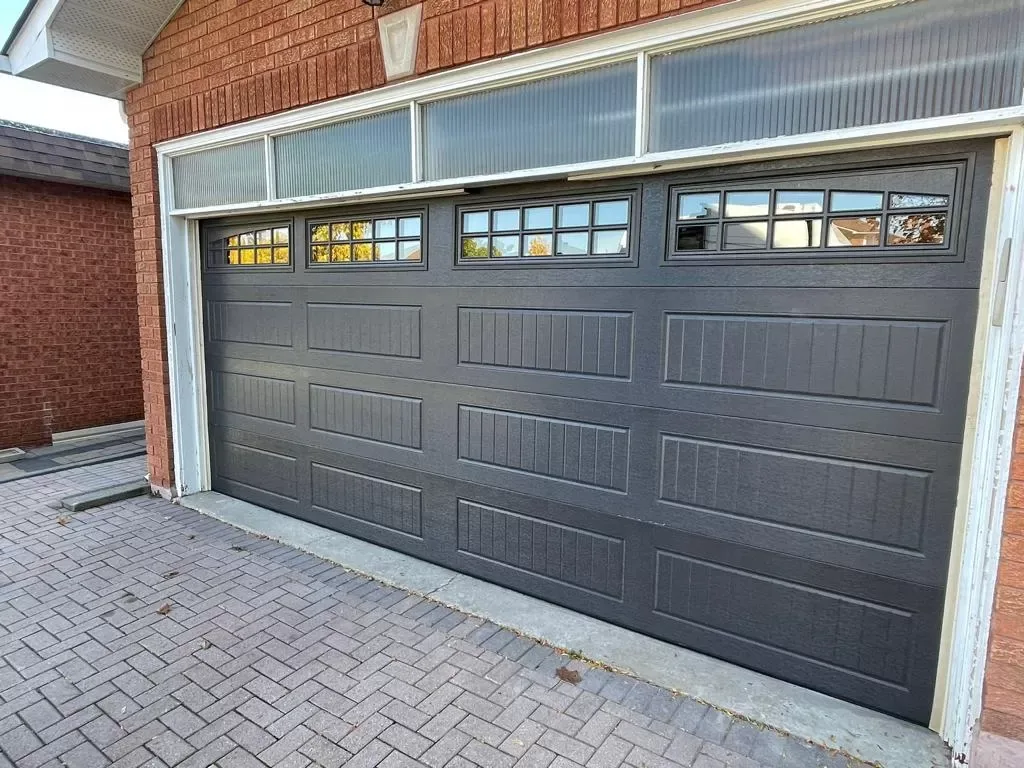 Brown insulated garage doors installation