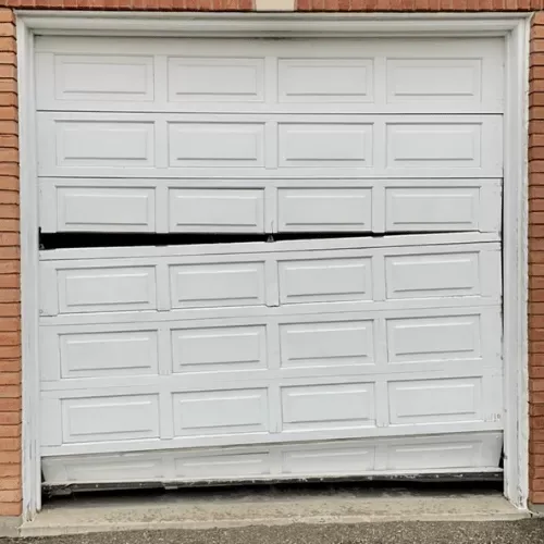 Off-track garage door repair